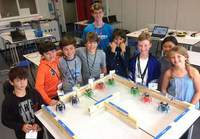 Group of children with robots they have built