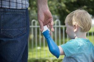 Child with prosthetic arm