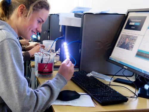 Girl learning coding and having fun